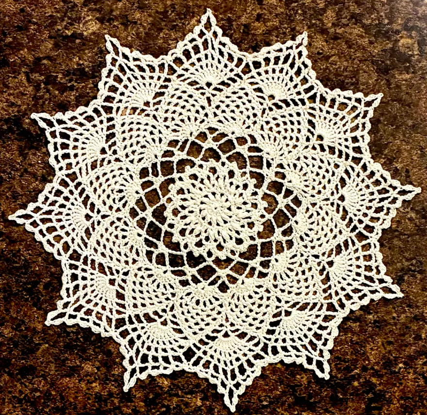 My completed Moonpetals doily, patterned by Julia Hart.